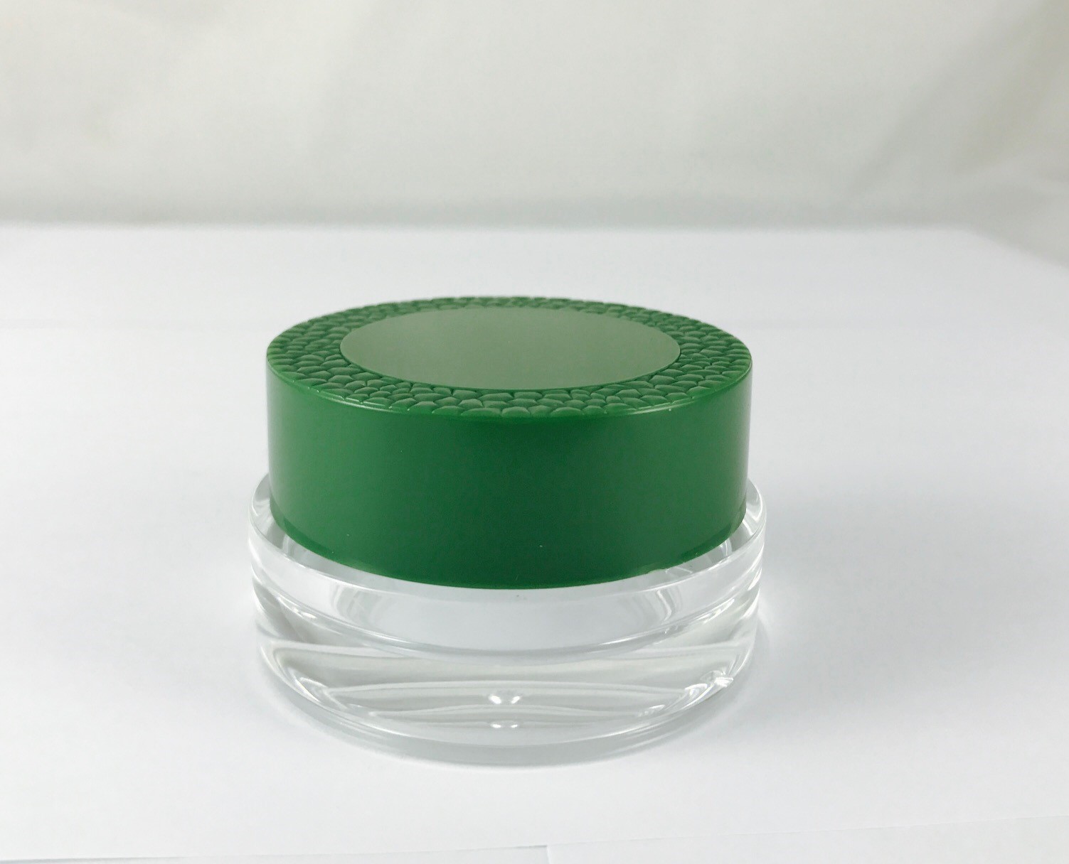 丸い緑色の射出成形キャップ